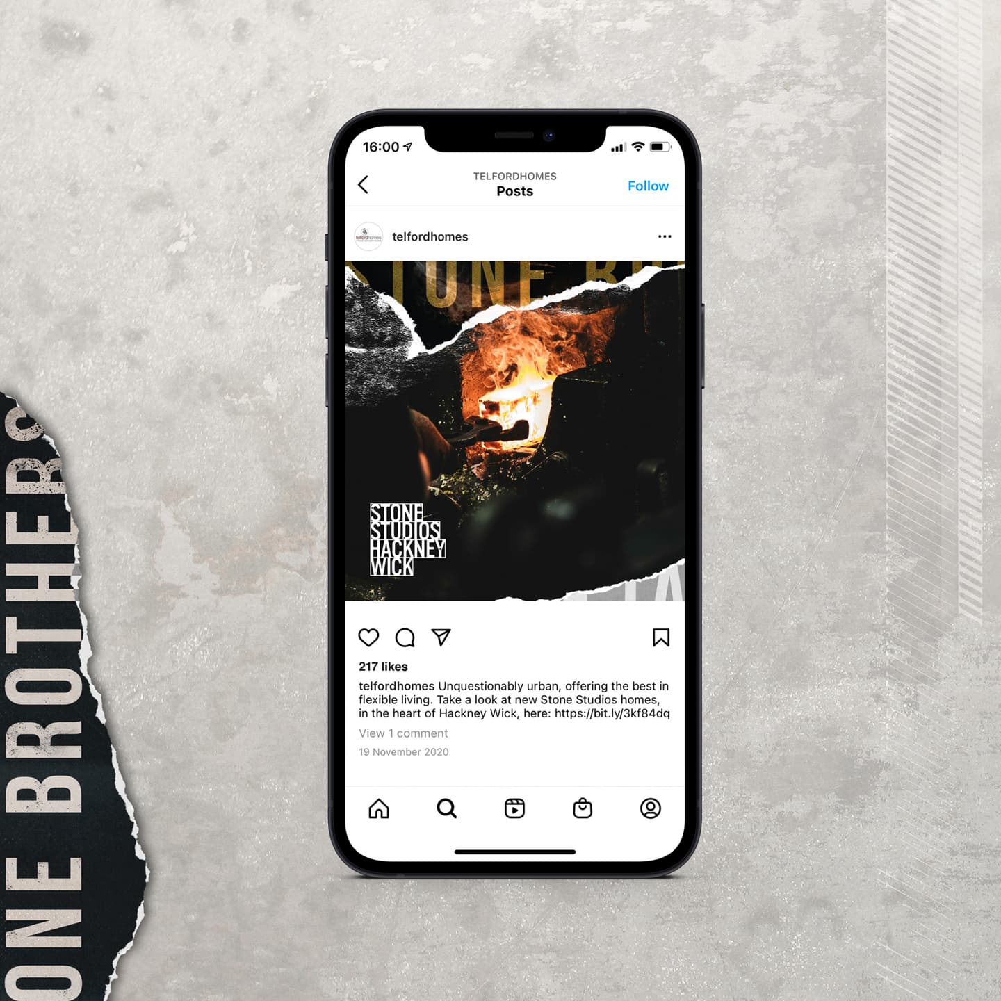 A smartphone displays an Instagram post featuring a dimly lit urban scene with text promoting Stone Studios in Hackney Wick. The phone rests on a textured, grey and beige background.