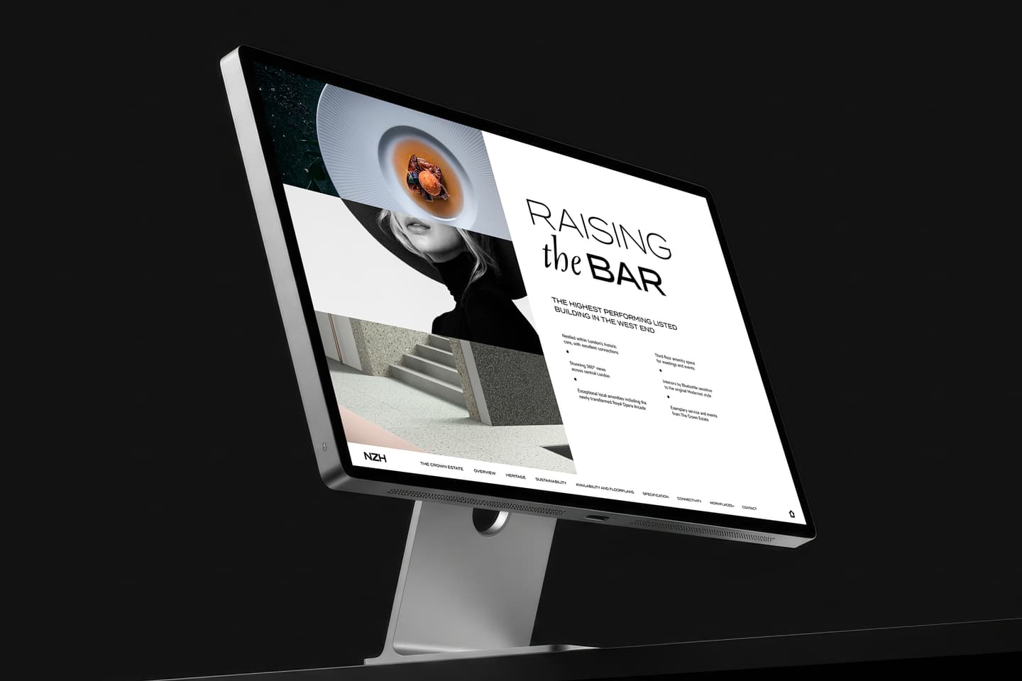 A computer monitor displays a modern website layout with the headline Raising the Bar, abstract images, and monochrome design elements on a dark background.